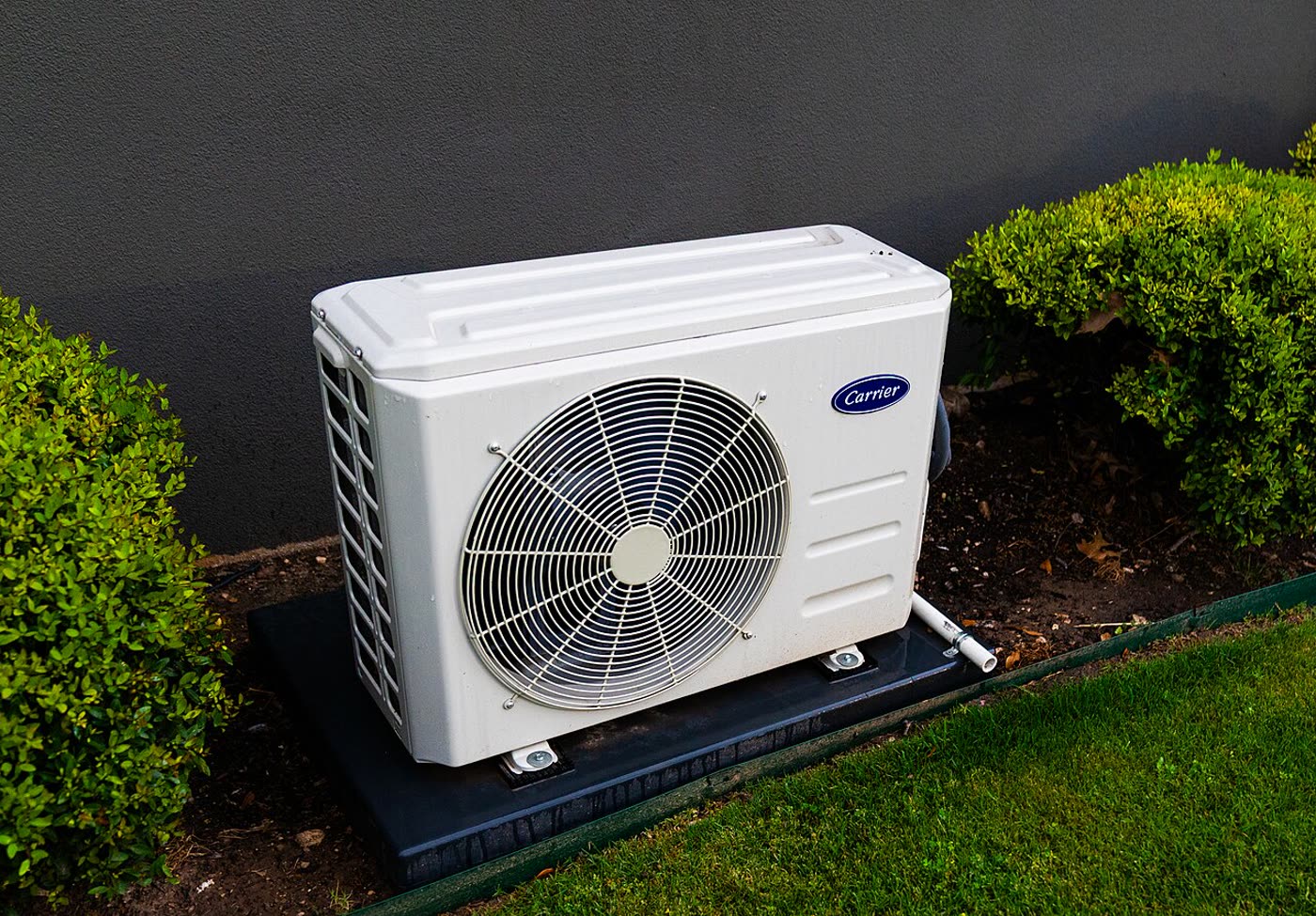 A Carrier outdoor unit with the line cover leaving the cabinet