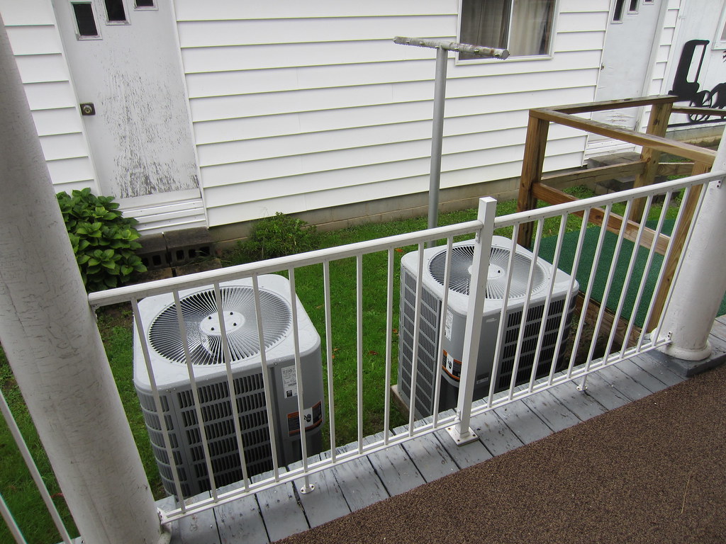 Outdoor condensers beside a house